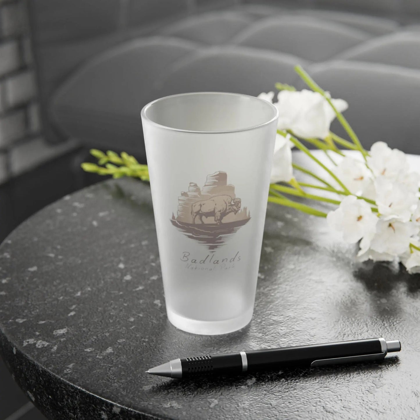 Badlands National Park frosted pint glass shown from alternate product angle