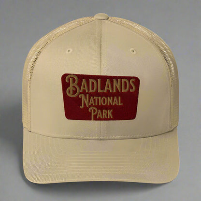 Badlands National Park sign embroidered trucker hat shown in lifestyle or modeled setting