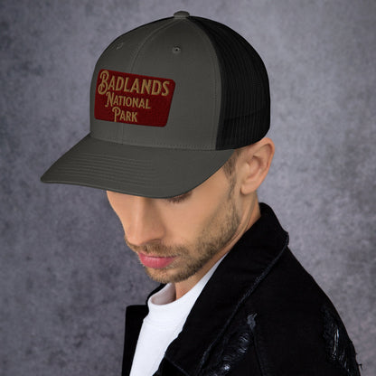 Badlands National Park sign embroidered trucker hat shown from alternate product angle