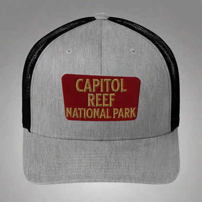 Capitol Reef National Park sign embroidered trucker hat shown in lifestyle or modeled setting