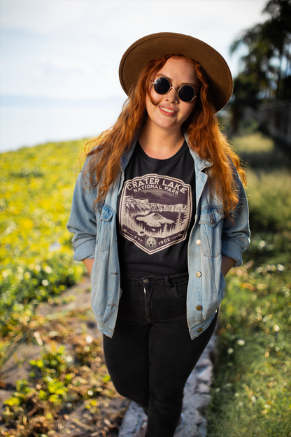 Crater Lake National Park rustic mountain shield graphic t-shirt shown in lifestyle or modeled setting