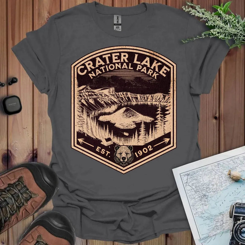 Crater Lake National Park rustic mountain shield graphic t-shirt shown from alternate product angle