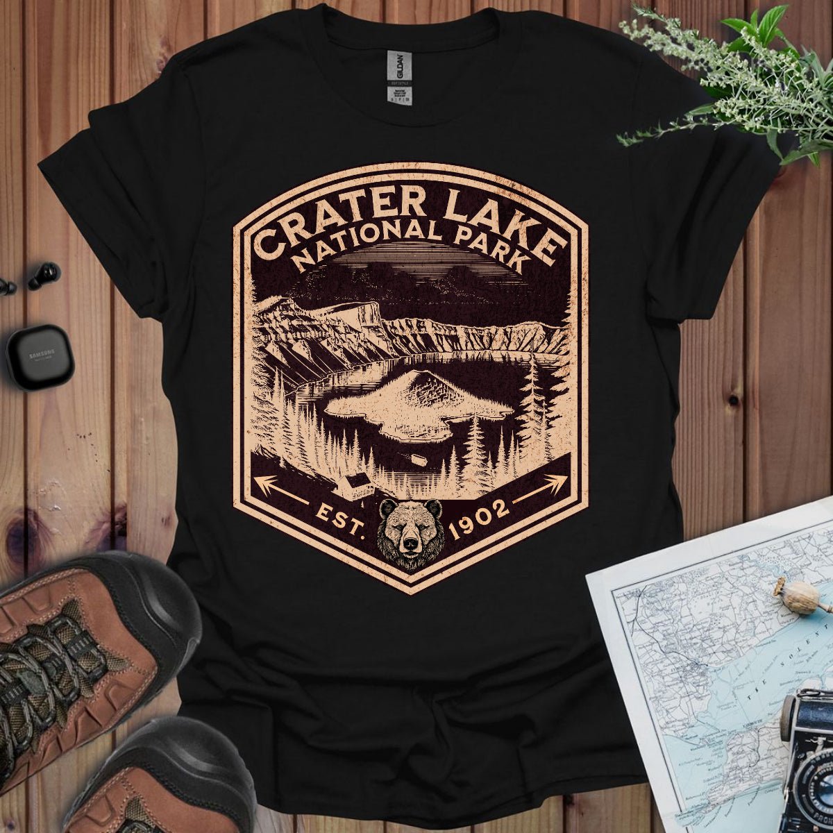 Crater Lake National Park rustic mountain shield graphic t-shirt shown in lifestyle or modeled setting