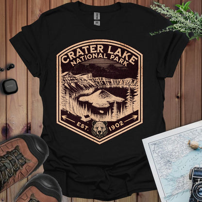 Crater Lake National Park rustic mountain shield graphic t-shirt shown in lifestyle or modeled setting