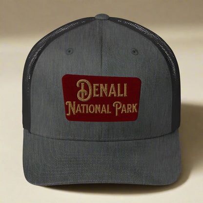 Denali National Park sign embroidered trucker hat shown from alternate product angle