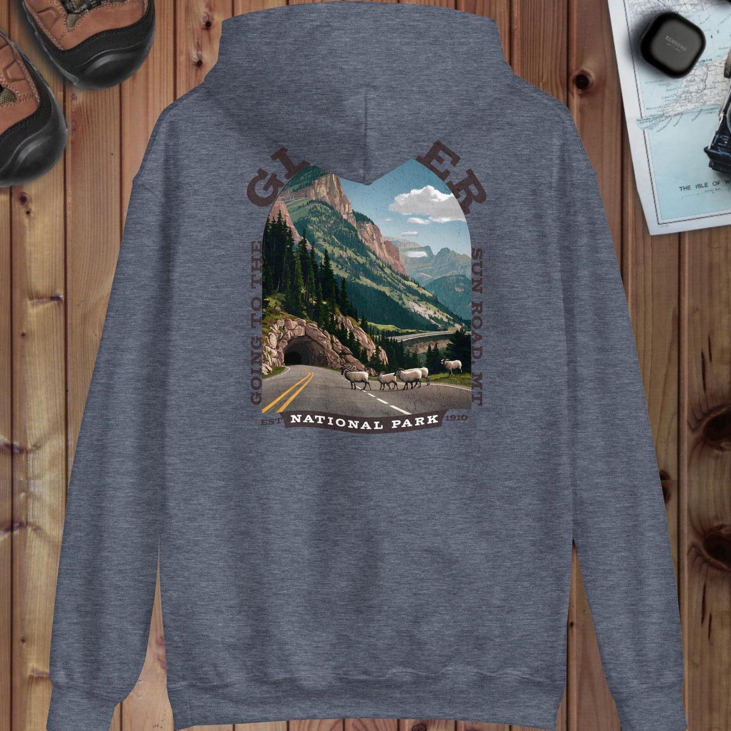 Glacier National Park sign hoodie with Sun Road back design shown in lifestyle or modeled setting