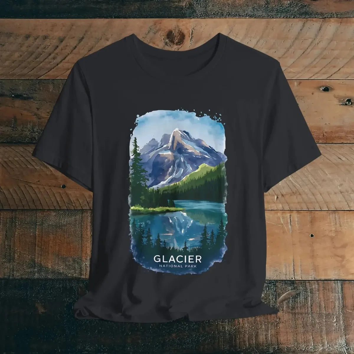 Glacier National Park watercolor style graphic t-shirt shown in lifestyle or modeled setting