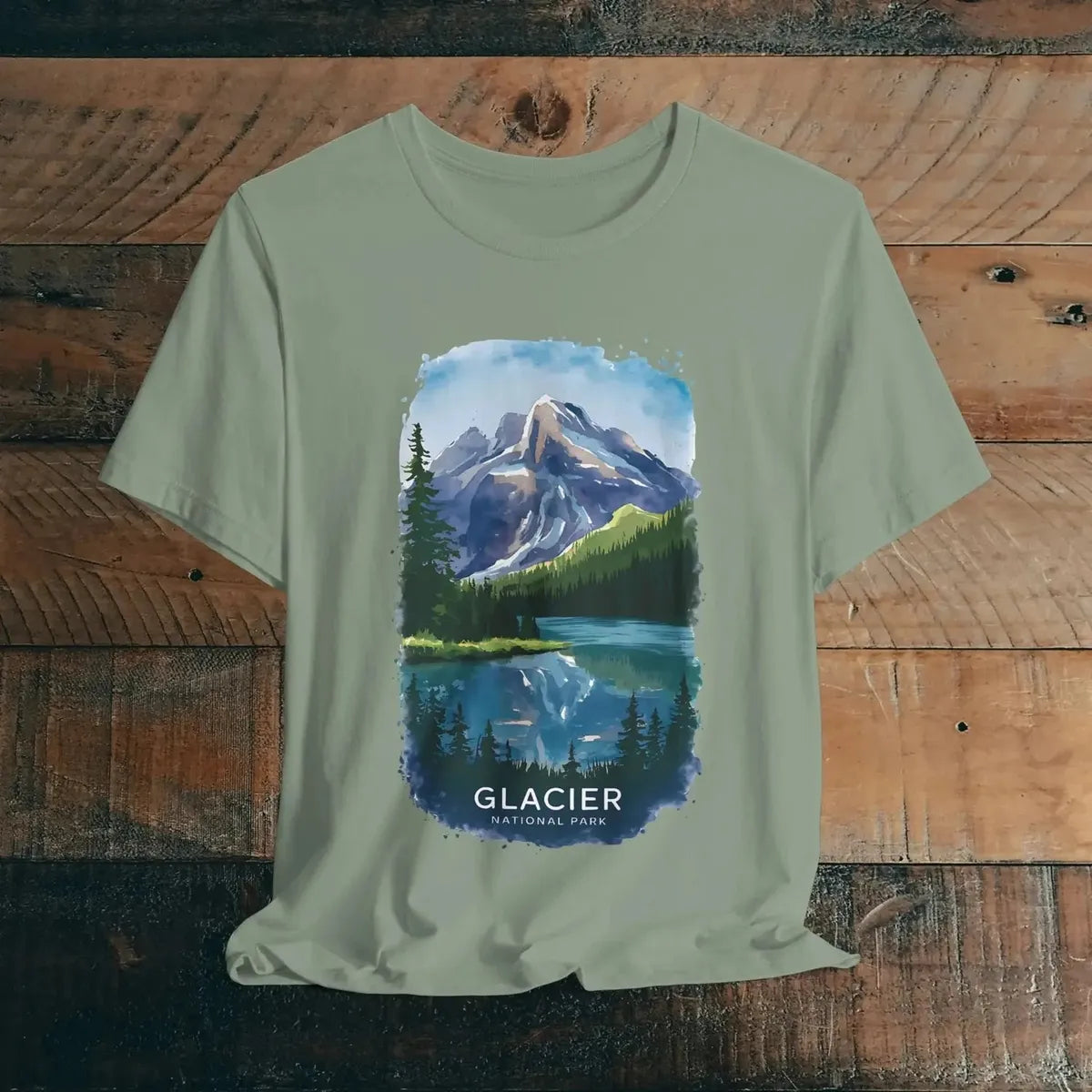 Glacier National Park watercolor style graphic t-shirt shown in alternate apparel color
