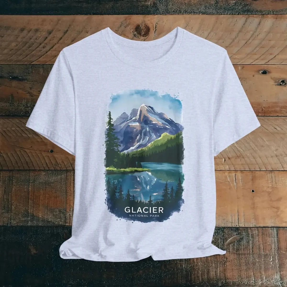 Glacier National Park watercolor style graphic t-shirt shown in alternate apparel color