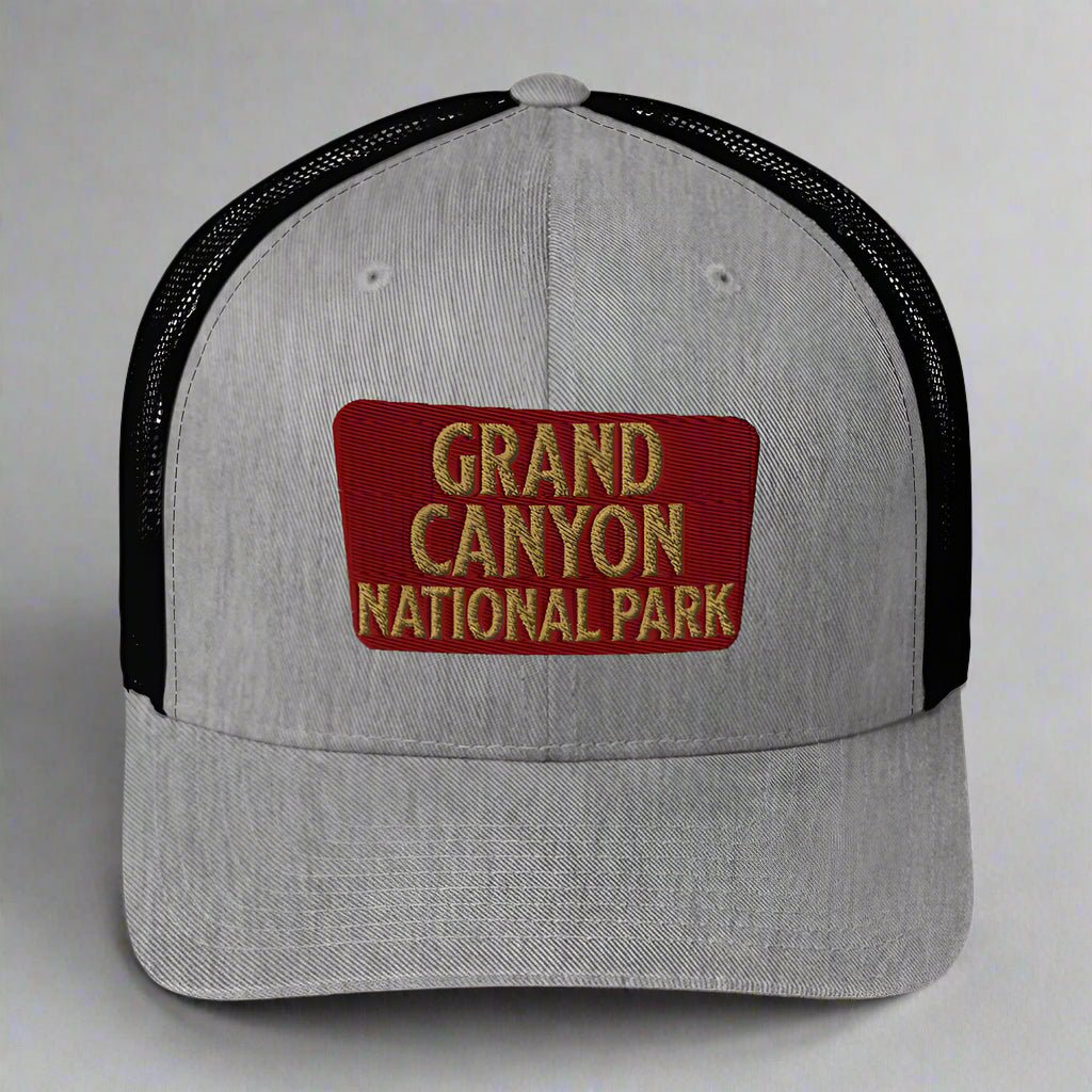 Grand Canyon National Park sign embroidered trucker hat shown in lifestyle or modeled setting