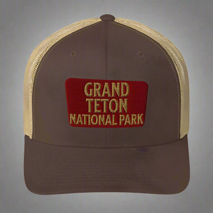 Grand Teton National Park sign embroidered trucker hat shown from alternate product angle