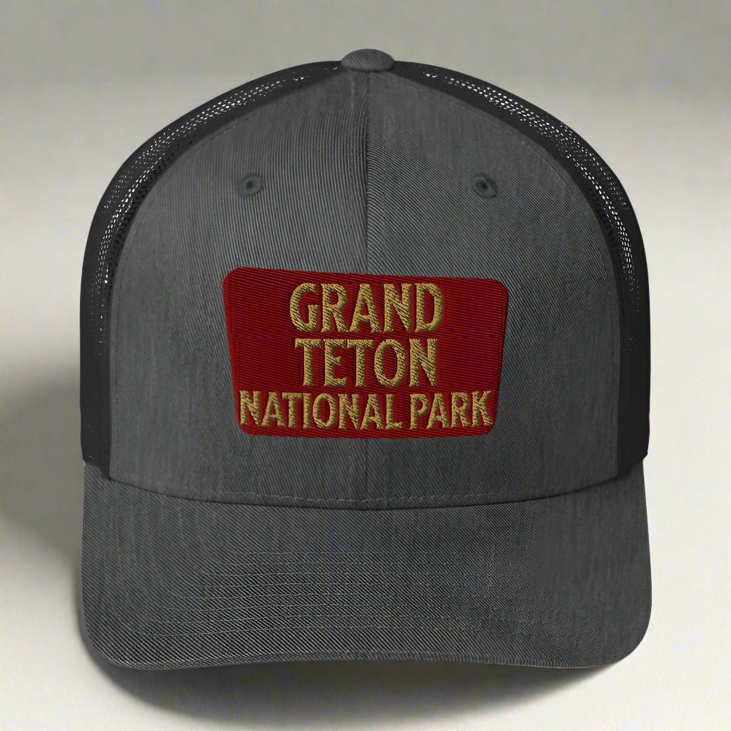 Grand Teton National Park sign embroidered trucker hat shown from alternate product angle