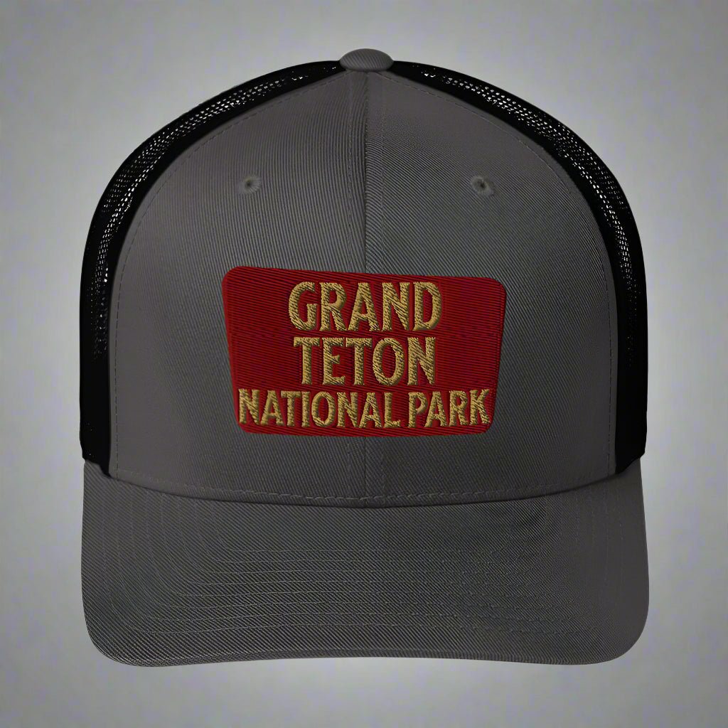 Grand Teton National Park sign embroidered trucker hat shown in lifestyle or modeled setting