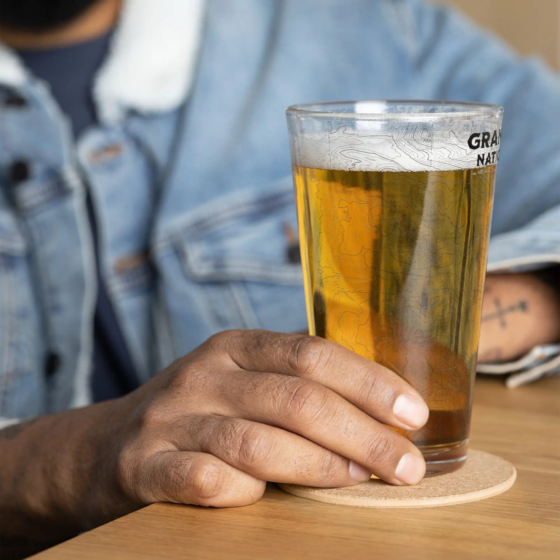 Grand Teton National Park topographic pint glass showing design detail or product variation