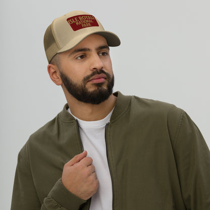 Isle Royale National Park sign embroidered trucker hat shown from alternate product angle
