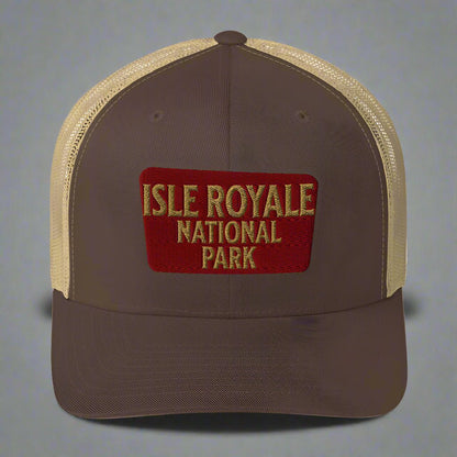 Isle Royale National Park sign embroidered trucker hat shown in lifestyle or modeled setting