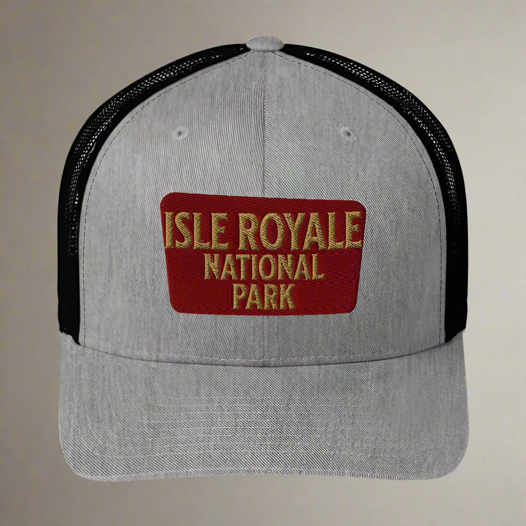 Isle Royale National Park sign embroidered trucker hat shown from alternate product angle
