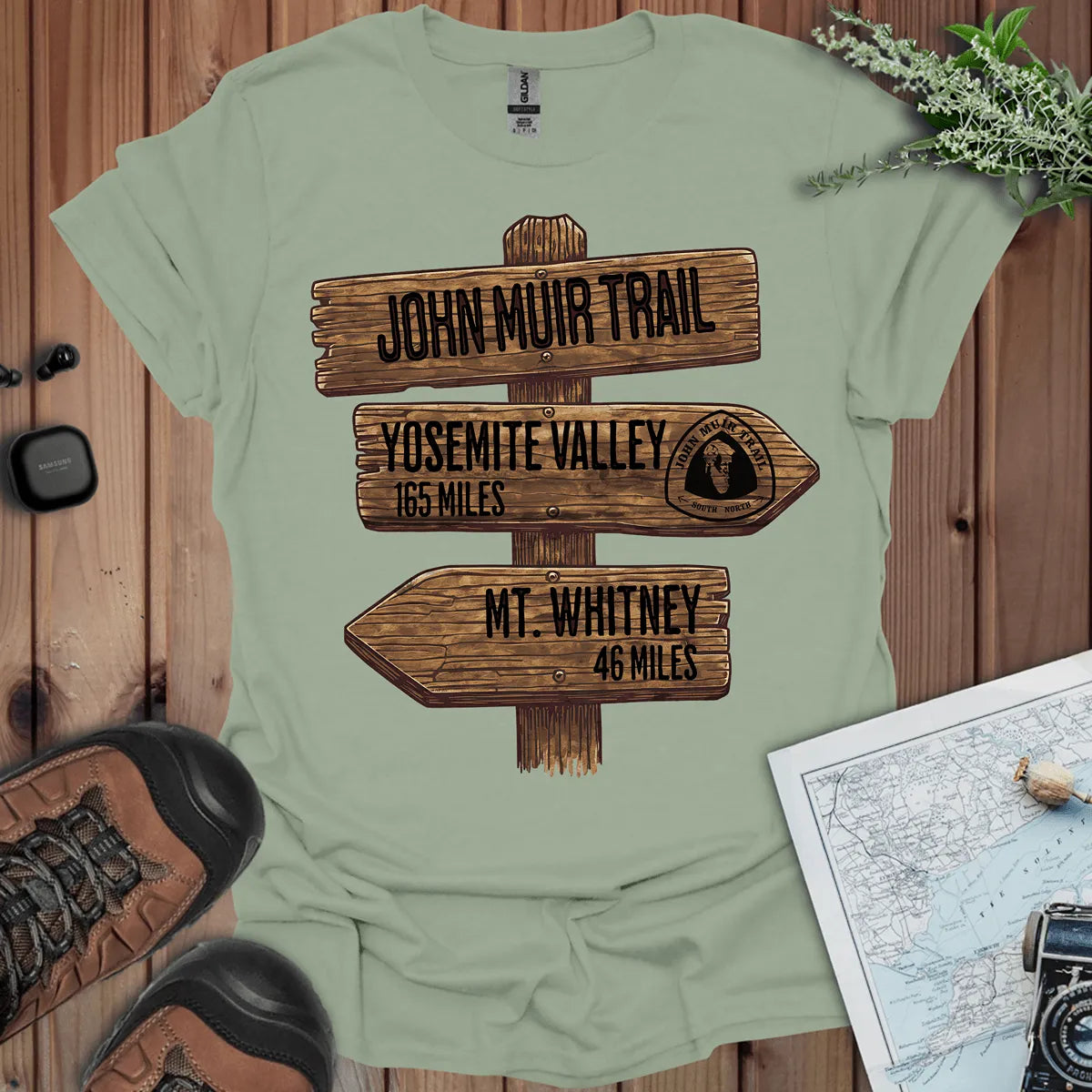John Muir Trail 211 miles wood sign graphic t-shirt shown in lifestyle or modeled setting