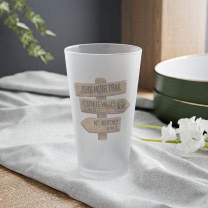 John Muir Trail wood mileage sign frosted pint glass shown from alternate product angle