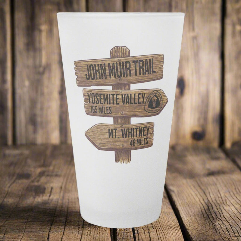 John Muir Trail wood mileage sign frosted pint glass shown as primary product image