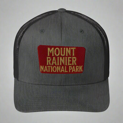 Mount Rainier National Park embroidered trucker hat shown in lifestyle or modeled setting