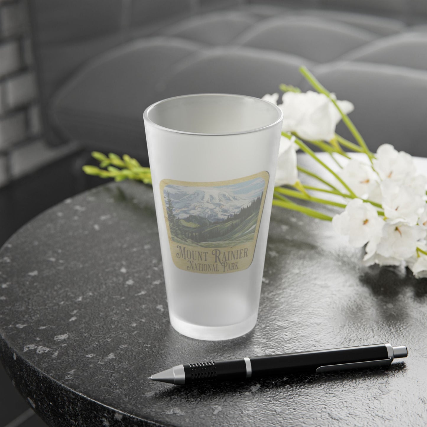 Mount Rainier National Park wood sign frosted pint glass shown from alternate product angle