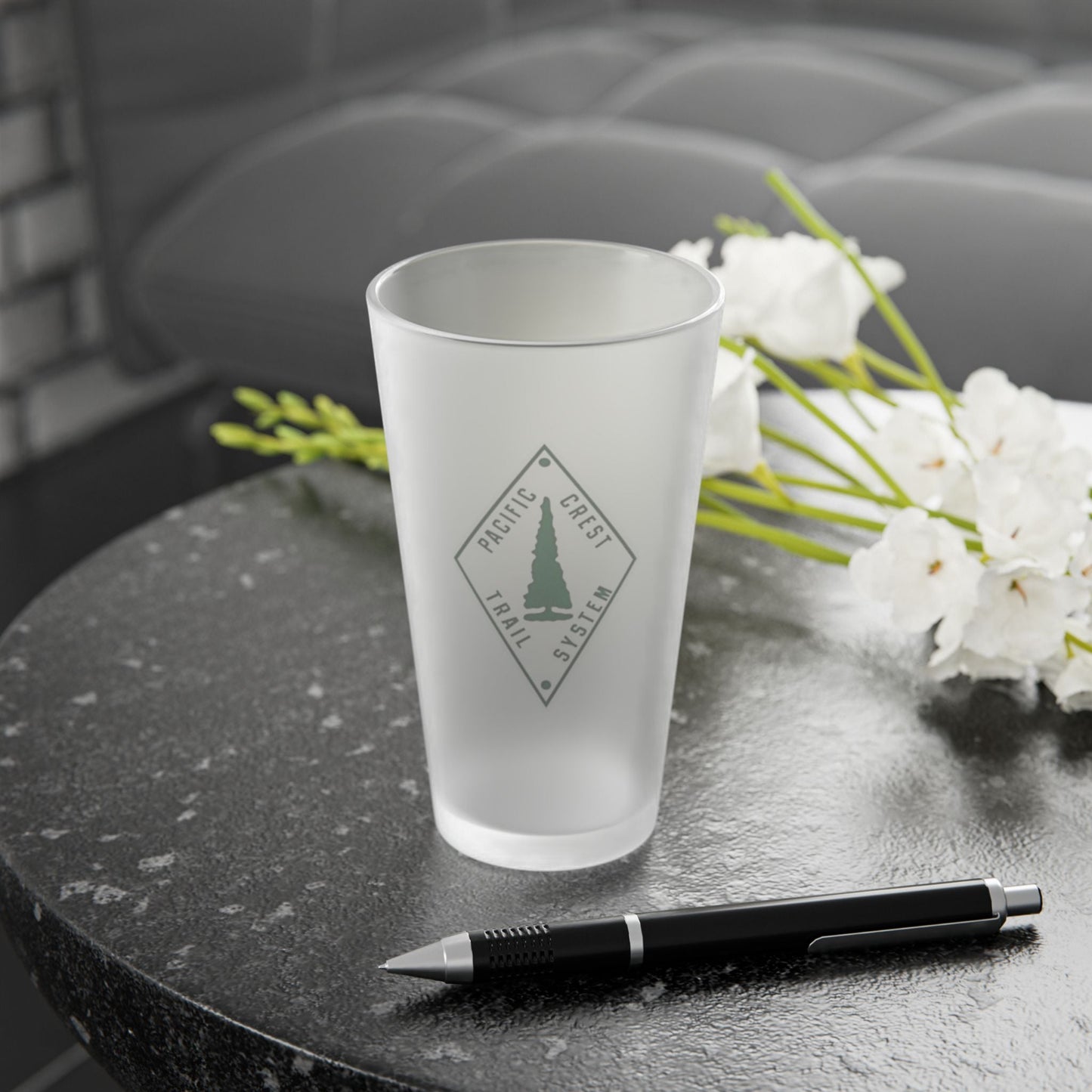 Pacific Crest Trail classic diamond trail marker frosted pint glass shown from alternate product angle