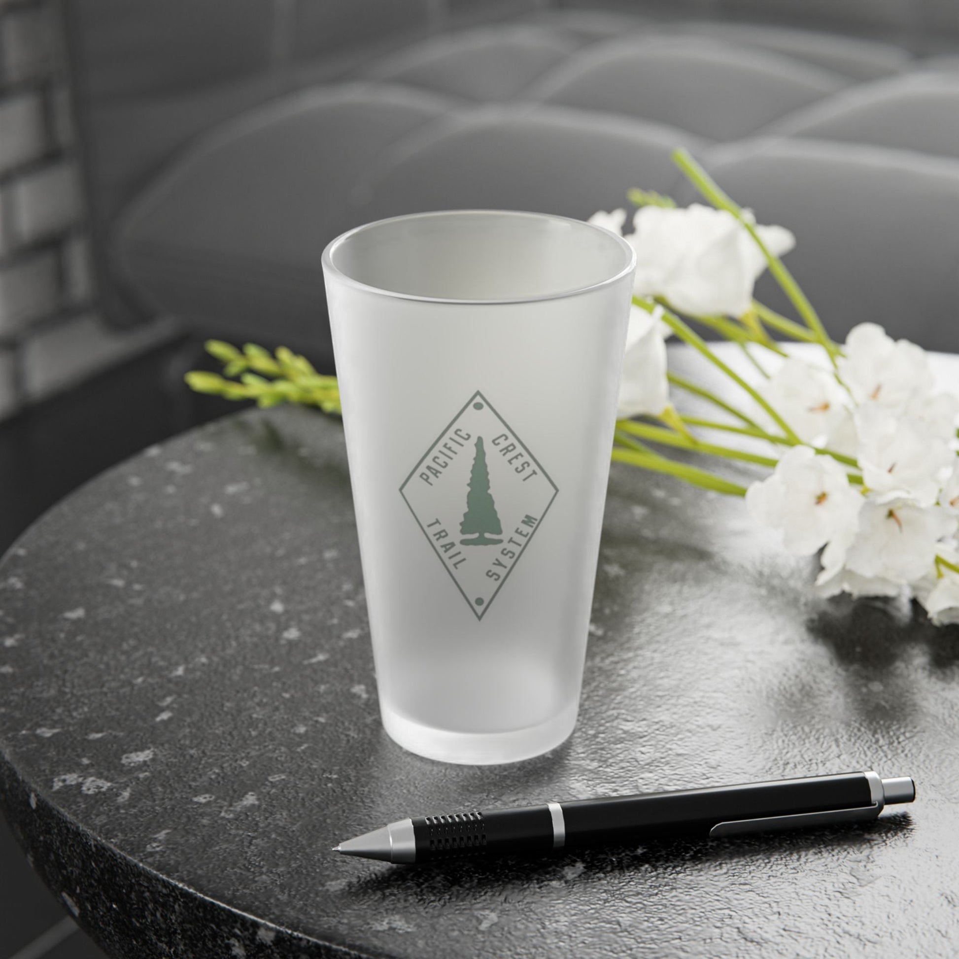 Pacific Crest Trail classic diamond trail marker frosted pint glass shown from alternate product angle