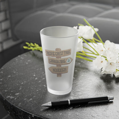 Pacific Crest Trail mileage sign frosted pint glass shown from alternate product angle