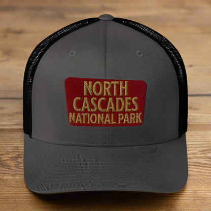 North Cascades National Park Embroidered Trucker Hat hat Park Service Apparel Charcoal/ Black