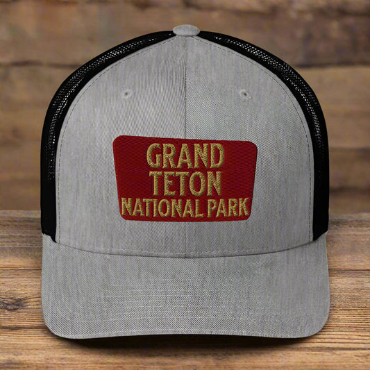Grand Teton National Park Sign Embroidered Trucker Hat hat Park Service Apparel Heather/ Black
