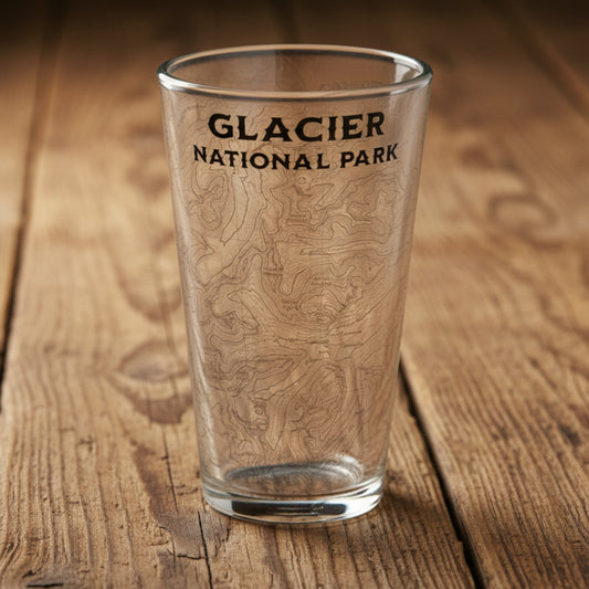 Clear glass with 'Glacier National Park' text and topographic map design on a white background