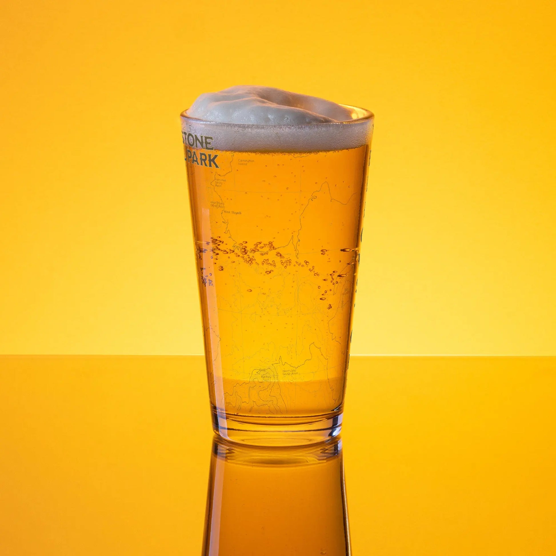 Yellowstone National Park Topographic Pint glass Drinkware Park Service Apparel