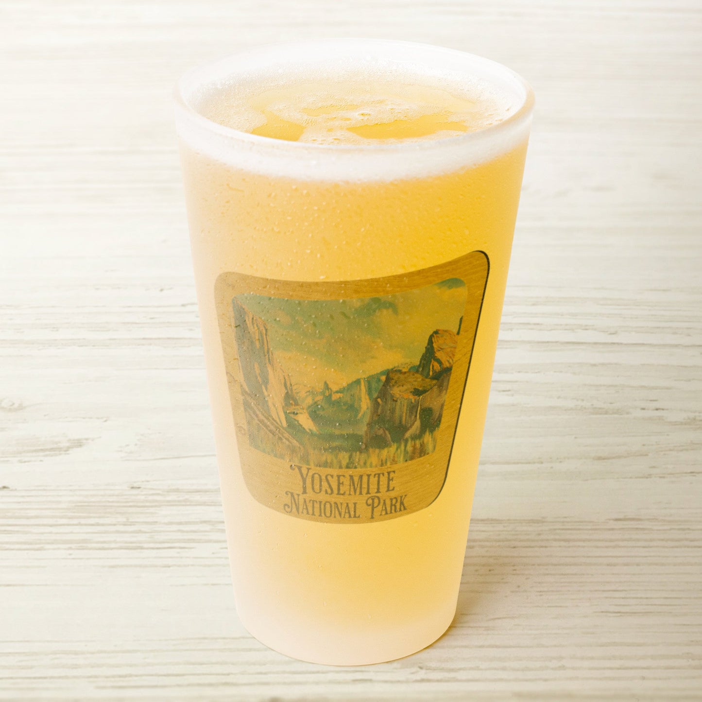Yosemite National Park scenic valley wood sign frosted pint glass shown from alternate product angle